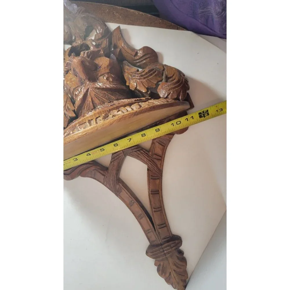 Beautifully Ornate Hand Carved Figural Wood Bracket Wall Shelf, set of two.